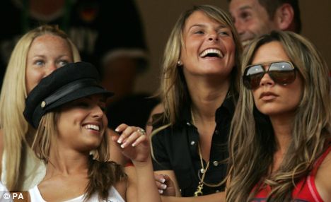 Famous WAGs Cheryl Cole, partner of Ashley Cole, Coleen McLoughlin, wife of Wayne Rooney and Victoria Beckham, wife of David Beckham, at the FIFA World Cup